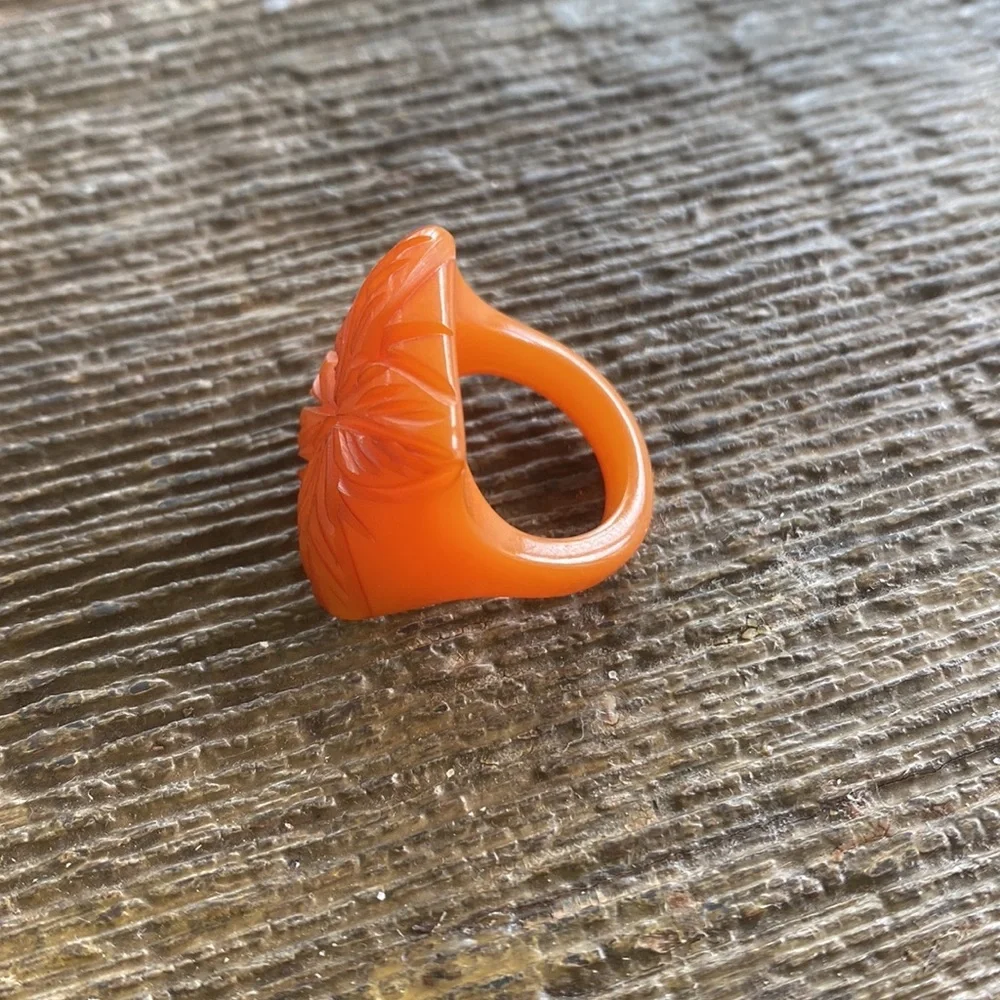 Vintage deeply carved Bakelite flower ring orange butter scotch egg yoke boho